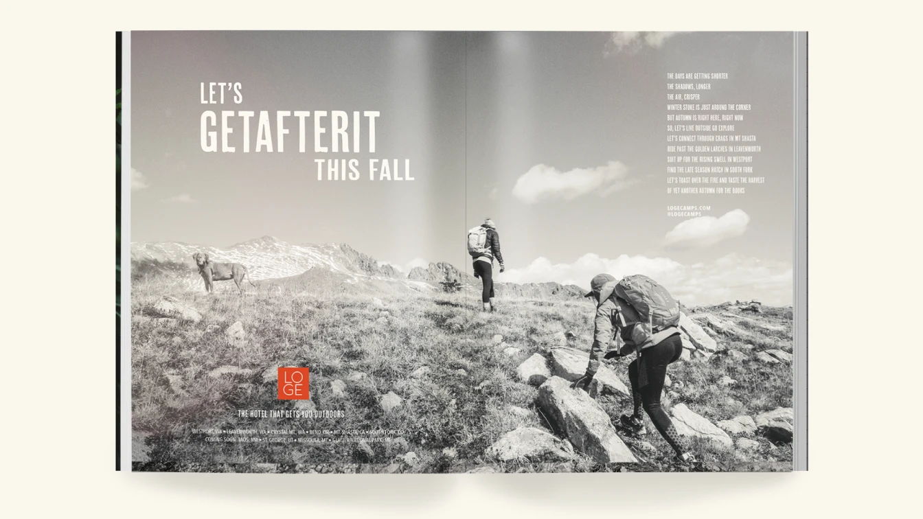 A two-page magazine spread featuring a black and white photograph of hikers and a dog climbing a rocky hillside. The left page displays the text "LET'S GETAFTERIT THIS FALL" in bold. The right page contains the copy: "The days are getting shorter, the shadows longer, the air crisper. Winter stoke is just around the corner, but autumn is right here, right now. So, let’s live outside, go explore. Let’s connect through crags in Mt. Shasta, ride past the golden larches in Leavenworth, suit up for the rising swell in Westport, find the late season hatch in South Fork. Let’s toast over the fire and taste the harvest of yet another autumn for the books." The Loge Camps logo and the tagline "The Hotel That Gets You Outdoors" are at the bottom right, followed by a list of locations and the website logecamps.com.