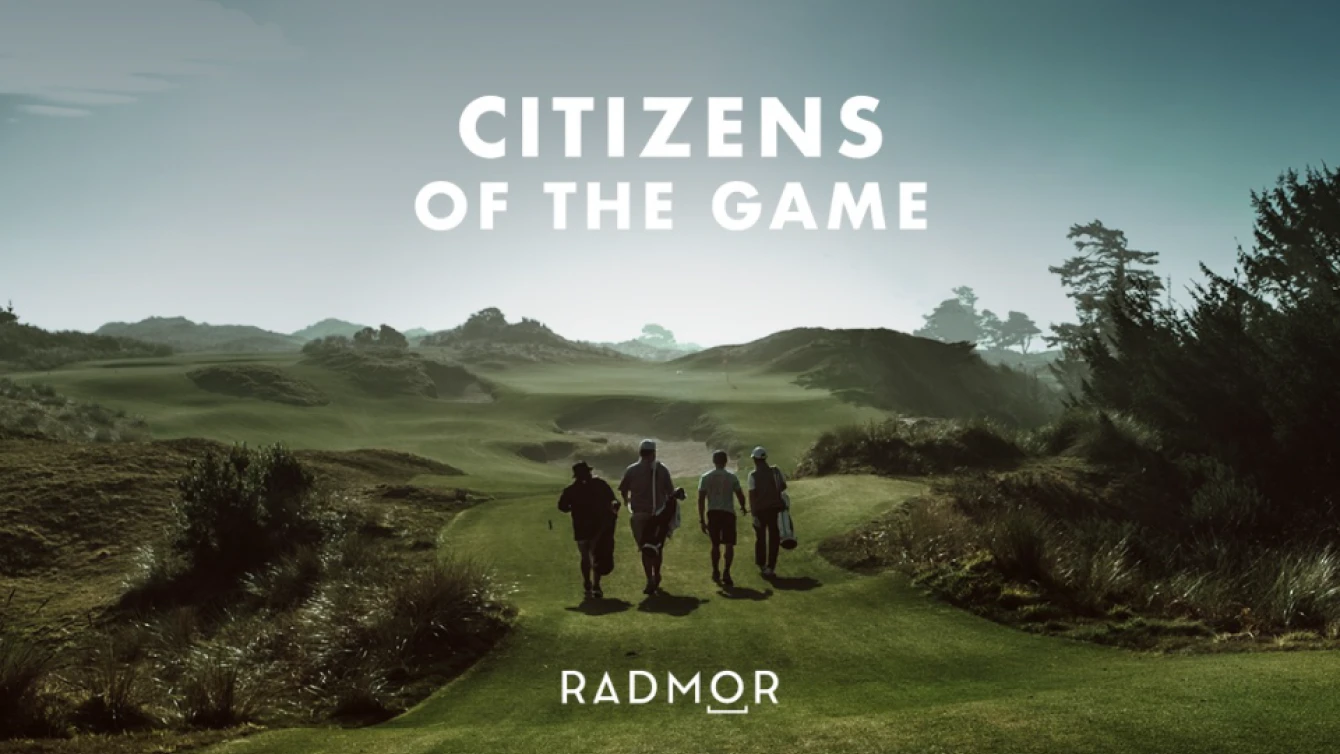 Four golfers walking on a lush, green golf course with rolling hills and trees in the background and the slogan "Citizens of the Game". The Radmor logo is at the bottom of the image.